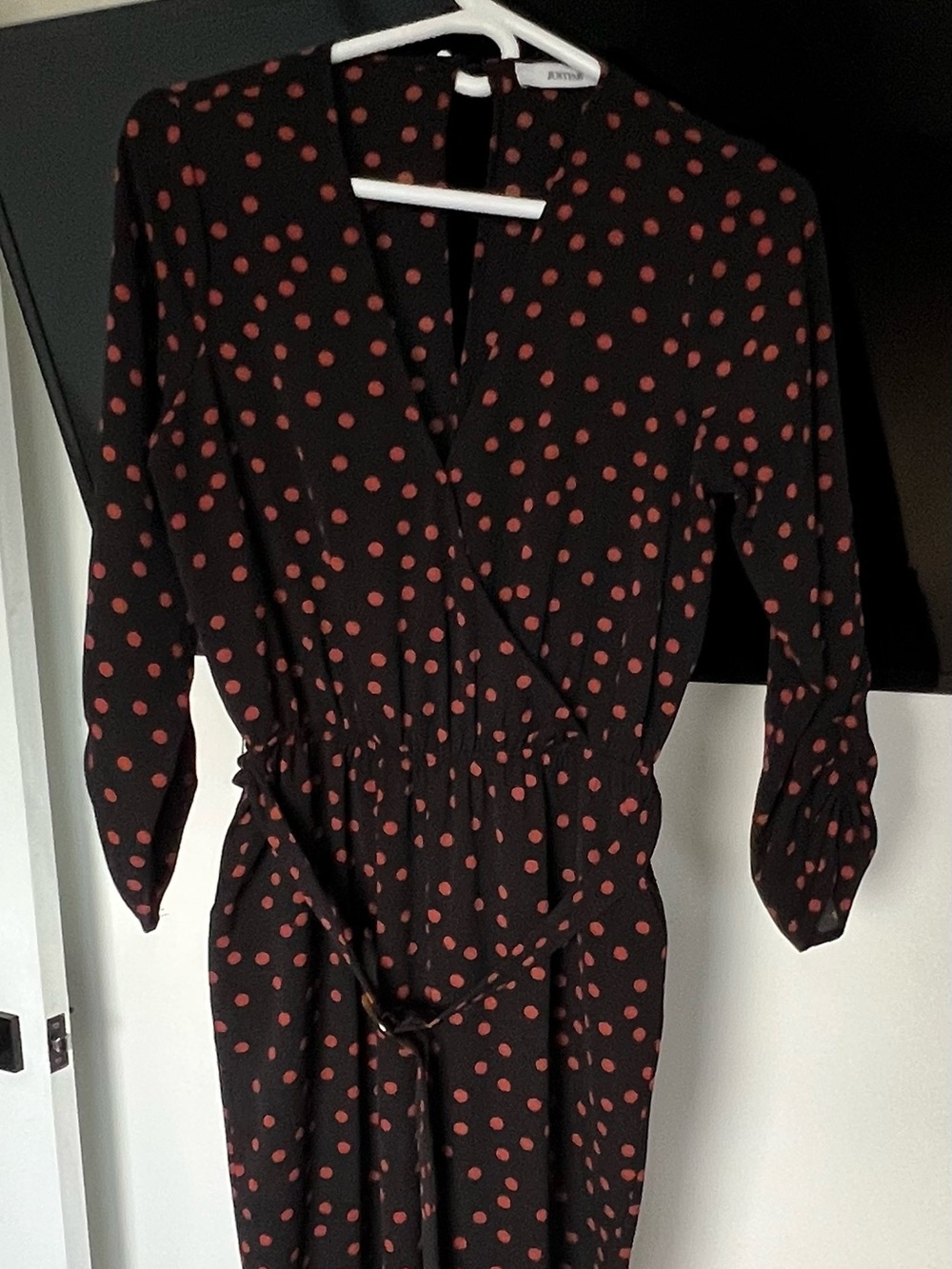 Black Polka Dot Wrap jumpsuit with orange Spots